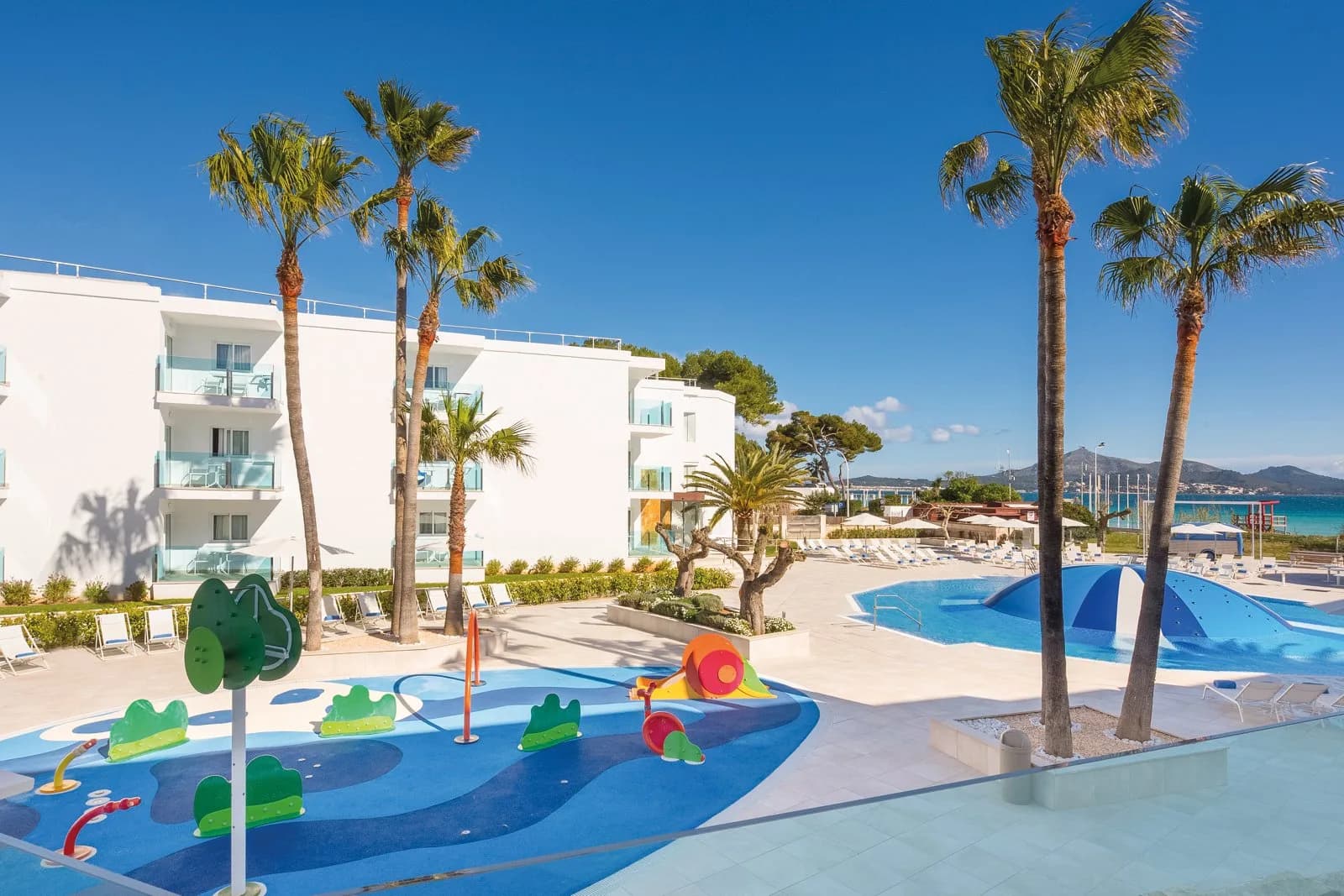 Iberostar Waves Playa de Muro hotel with its children’s splash area and seafront setting